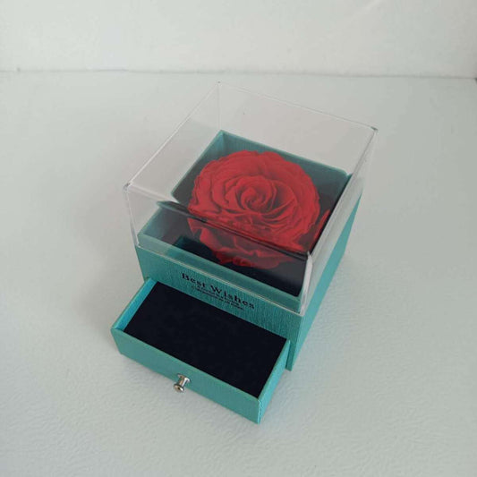 Ecrin à bijou Turquoise 9x9x10cm avec rose éternel rouge dia. 5-6cm