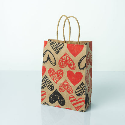 Sacs Kraft poignees torsadees motifs coeur L. 21 x 15cm