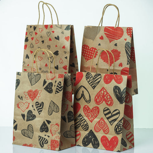 Sacs Kraft poignees torsadees motifs coeur L. 27 x 21cm