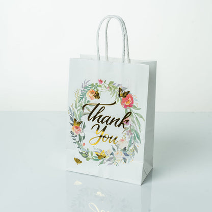 Sacs Kraft poignees torsadees motifs fleurie L. 21 x 15cm