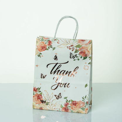 Sacs Kraft poignees torsadees motifs fleurie L. 27 x 21cm