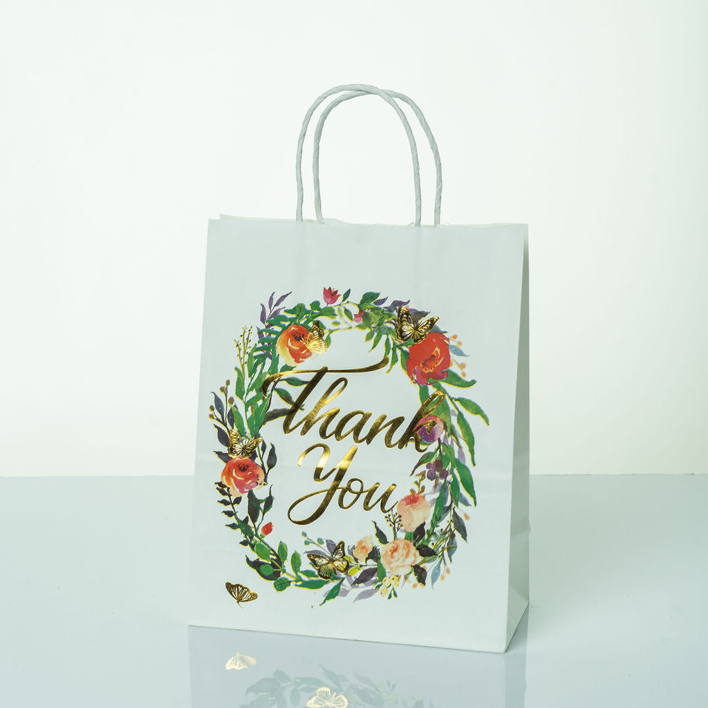 Sacs Kraft poignees torsadees motifs fleurie L. 27 x 21cm